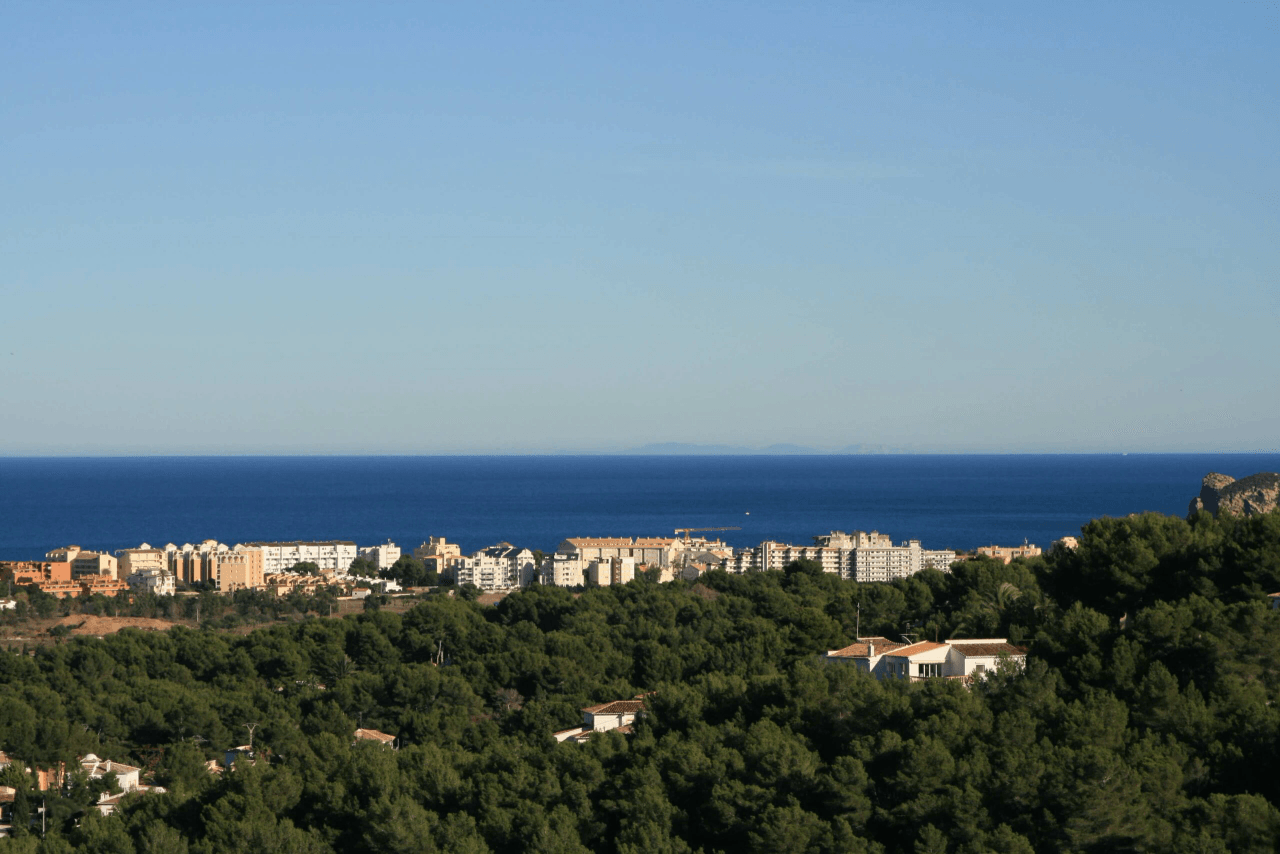 4402JAV 3 aaneenliggende bouwgronden met zeezicht te koop in Jávea